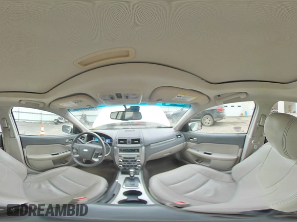 2012 Ford Fusion Hybrid with VIN 3FADP0L34CR414234, listed as a Copart auction lot 58891715 with 147,409 mi miles and Salvage title. Bid and sale history available at DreamBid. Image 15.