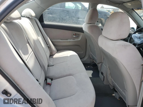 2007 Kia Spectra EX with VIN KNAFE121275411319, listed as a Copart auction lot 58716045 with 309,488 mi miles and Salvage title. Bid and sale history available at DreamBid. Image 10.