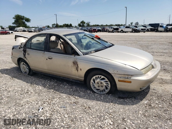 1998 Saturn SL z VIN 1G8ZK5271WZ265579, wystawiony jako Copart lot #68153934 z przebiegiem Nie podano mil oraz Szkoda całkowita • Salvage title. Historia ofert i sprzedaży dostępna na DreamBid. Obrazek 4.