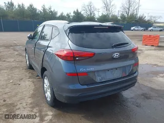 2019 Hyundai Tucson Value with VIN KM8J33A40KU999340, listed as a IAAI auction lot 41876380 with 52,752 mi miles. Bid and sale history available at carsss.com. Image 3.
