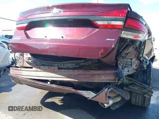2017 Ford Fusion Energi SE with VIN 3FA6P0PU5HR274892, listed as a IAAI auction lot 41823526 with 188,746 mi miles. Bid and sale history available at carsss.com. Image 6.