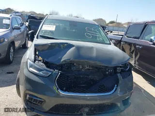 2023 Chrysler Pacifica Hybrid Touring L with VIN 2C4RC1L75PR599135, listed as a IAAI auction lot 39785830 with 28,781 mi miles. Bid and sale history available at carsss.com. Image 13.