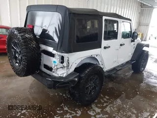 2016 Jeep Wrangler Unlimited Rubicon with VIN 1C4HJWFG4GL127379, listed as a IAAI auction lot 41732688 with 110,193 mi miles. Bid and sale history available at carsss.com. Image 4.