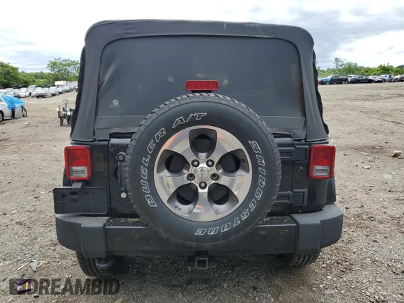 2016 Jeep Wrangler Unlimited Sahara with VIN 1C4BJWEG8GL150249, listed as a Copart auction lot 57574525 with 104,206 mi miles and Salvage title. Bid and sale history available at DreamBid. Image 6.