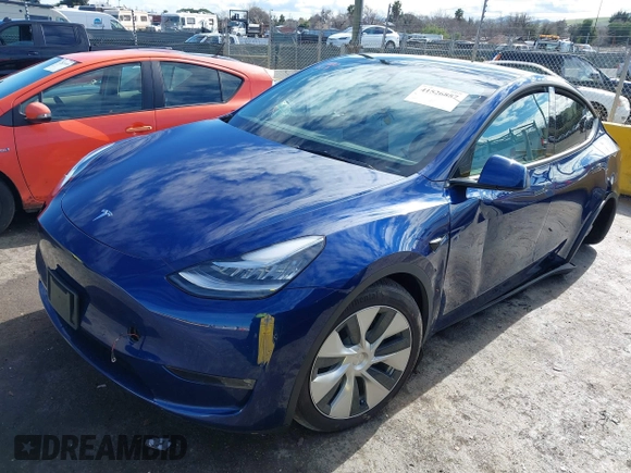 2022 Tesla Model Y Long Range with VIN 7SAYGDEE6NF318372, listed as a IAAI auction lot 41526857 with 26,083 mi miles and . Bid and sale history available at carsss.com. Image 20.