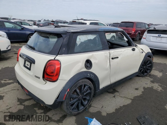 2020 MINI Hardtop Cooper with VIN WMWXR3C03L2M73723, listed as a Copart auction lot 45218215 with 67,807 mi miles and Salvage title. Bid and sale history available at DreamBid. Image 3.