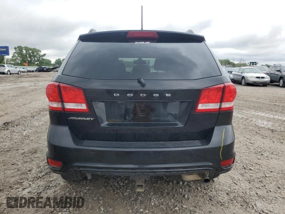 2019 Dodge Journey SE z VIN 3C4PDCBB1KT798081, wystawiony jako Copart lot #58491395 z przebiegiem 102 740 mil mil oraz Szkoda całkowita • Salvage title. Historia ofert i sprzedaży dostępna na DreamBid. Obrazek 6.