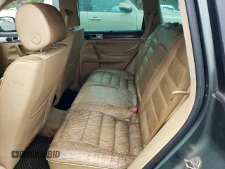 2006 Volkswagen Touareg 4.2L V8 z VIN WVGZM77L16D049631, wystawiony jako Copart lot #84882844 z przebiegiem Nie podano mil oraz Szkoda całkowita • Salvage title. Historia ofert i sprzedaży dostępna na DreamBid. Obrazek 11.