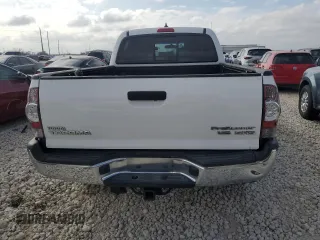 2014 Toyota Tacoma PreRunner with VIN 3TMKU4HN7EM040312, listed as a Copart auction lot 87420864 with 68,853 mi miles and Salvage title. Bid and sale history available at DreamBid. Image 6.