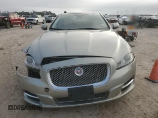 2014 Jaguar XJ with VIN SAJWA2GZ8E8V60138, listed as a Copart auction lot 86384064 with 137,190 mi miles and Salvage Title. Bid and sale history available at carsss.com. Image 5.