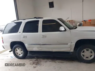 2004 GMC Yukon SLE z VIN 1GKEC13V64R107506, wystawiony jako IAAI lot #41407353 z przebiegiem 215 127 mil mil oraz . Historia ofert i sprzedaży dostępna na DreamBid. Obrazek 6.
