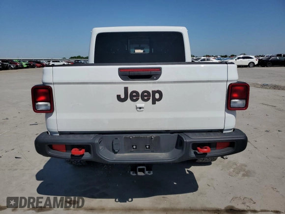 2023 Jeep Gladiator Rubicon with VIN 1C6JJTBG3PL525874, listed as a Copart auction lot 53283145 with 37,606 mi miles and Salvage Title. Bid and sale history available at carsss.com. Image 6.