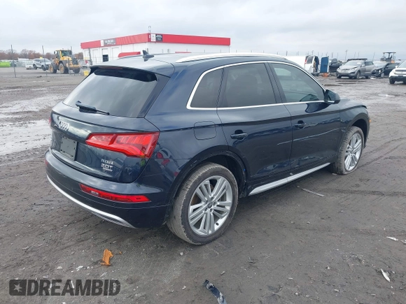 2018 Audi Q5 Premium Plus z VIN WA1BNAFYXJ2092411, wystawiony jako IAAI lot #41051336 z przebiegiem 54 595 mil mil oraz . Historia ofert i sprzedaży dostępna na DreamBid. Obrazek 4.