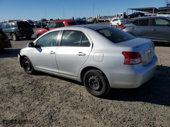 2011 Toyota Yaris with VIN JTDBT4K35B1409879, listed as a Copart auction lot 88090195 with 133,900 mi miles and Salvage Title. Bid and sale history available at carsss.com. Image 2.