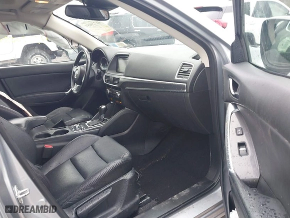 2016 Mazda CX-5 Grand Touring with VIN JM3KE4DY0G0816466, listed as a IAAI auction lot 41720059 with NaN miles. Bid and sale history available at carsss.com. Image 5.