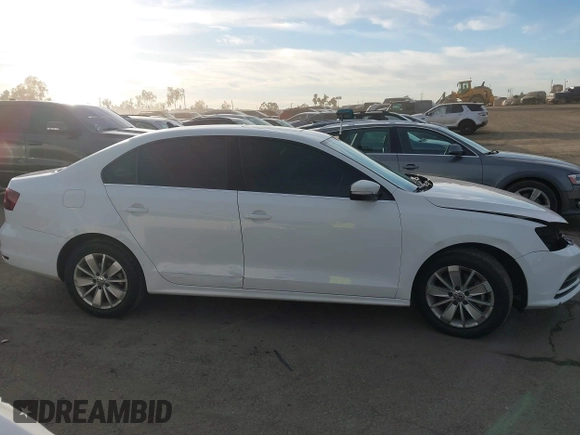 2016 Volkswagen Jetta Sedan 1.4T SE with VIN 3VWD67AJXGM365869, listed as a IAAI auction lot 41261109 with 59,325 mi miles. Bid and sale history available at carsss.com. Image 14.