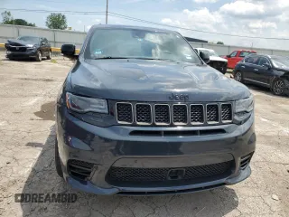2018 Jeep Grand Cherokee Trackhawk with VIN 1C4RJFN99JC309254, listed as a Copart auction lot 64061615 with 104,558 mi miles and Clean title. Bid and sale history available at DreamBid. Image 5.