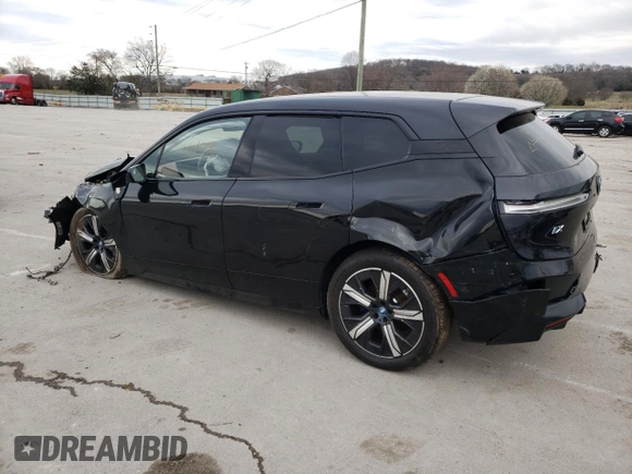 2022 BMW iX xDrive50 с VIN WB523CF0XNCJ77116, выставлен на аукционе Copart как лот 42071493 с пробегом 4 478 миль миль и . История ставок и продаж доступна на DreamBid. Изображение 2.