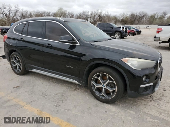 2017 BMW X1 xDrive28i with VIN WBXHT3C35H5F68752, listed as a Copart auction lot 49414675 with 114,308 mi miles and Clean Title. Bid and sale history available at carsss.com. Image 4.