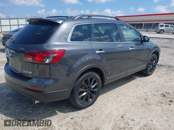 2014 Mazda CX-9 Grand Touring with VIN JM3TB2DA4E0436340, listed as a IAAI auction lot 42442249 with 102,856 mi miles and . Bid and sale history available at DreamBid. Image 4.