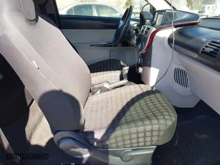 2012 Scion iQ with VIN JTNJJXB00CJ009265, listed as a IAAI auction lot 41742947 with 95,857 mi miles. Bid and sale history available at carsss.com. Image 5.