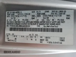 2011 Ford Econoline Passenger XL with VIN 1FBNE3BL8BDA53030, listed as a Copart auction lot 69919024 with 196,386 mi miles and Salvage Title. Bid and sale history available at carsss.com. Image 14.