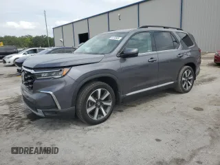 2023 Honda Pilot Touring with VIN 5FNYG2H7XPB000031, listed as a Copart auction lot 54153935 with 24,172 mi miles and Salvage title. Bid and sale history available at DreamBid. Image 1.