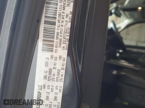 2013 Ram 1500 with VIN 3C6JR7CT6DG577410, listed as a Copart auction lot 48535205 with 75,507 mi miles and Salvage title. Bid and sale history available at DreamBid. Image 12.