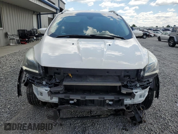 2015 Ford Escape Titanium z VIN 1FMCU9J90FUC41606, wystawiony jako Copart lot #57458455 z przebiegiem 71 671 mil mil oraz Szkoda całkowita • Salvage title. Historia ofert i sprzedaży dostępna na DreamBid. Obrazek 5.