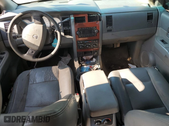 2004 Dodge Durango SLT z VIN 1D4HD48N94F193222, wystawiony jako Copart lot #67905294 z przebiegiem 293 754 mil mil oraz Szkoda całkowita • Salvage title. Historia ofert i sprzedaży dostępna na DreamBid. Obrazek 8.