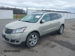 2015 Chevrolet Traverse LTZ z VIN 1GNKRJKD6FJ237851, wystawiony jako IAAI lot #41847524 z przebiegiem 84 809 mil mil oraz . Historia ofert i sprzedaży dostępna na DreamBid. Obrazek 2.