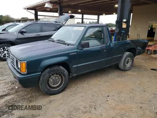1993 Mitsubishi Mighty Max z VIN JA7LS21G6PP003529, wystawiony jako Copart lot #81342224 z przebiegiem 313 363 mil mil oraz Szkody całkowita. Historia ofert i sprzedaży dostępna na DreamBid. Obrazek 1.