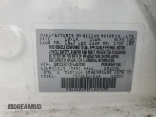 2015 Nissan Note S z VIN 3N1CE2CP3FL407294, wystawiony jako Copart lot #59571545 z przebiegiem 124 445 mil mil oraz Szkoda całkowita • Salvage title. Historia ofert i sprzedaży dostępna na DreamBid. Obrazek 13.