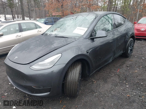 2025 Tesla Model Y Long Range with VIN 7SAYGDED0SA357488, listed as a IAAI auction lot 41550514 with 6 mi miles and . Bid and sale history available at DreamBid. Image 2.