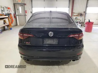 2019 Volkswagen Jetta GLI S z VIN 3VW5T7BU9KM142852, wystawiony jako Copart lot #49419395 z przebiegiem 99 203 mil mil oraz Szkody całkowita. Historia ofert i sprzedaży dostępna na DreamBid. Obrazek 6.