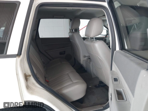 2005 Jeep Grand Cherokee Laredo with VIN 1J4GR48K25C599307, listed as a IAAI auction lot 42705166 with 231,747 mi miles and . Bid and sale history available at DreamBid. Image 8.