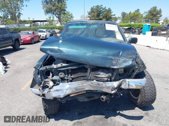 1995 Toyota Tacoma with VIN 4TAUN53B5SZ082797, listed as a IAAI auction lot 42660124 with 181,066 mi miles and . Bid and sale history available at DreamBid. Image 12.