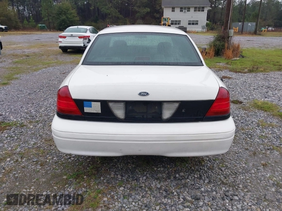 2005 Ford Police Interceptor z VIN 2FAFP71W25X139210, wystawiony jako IAAI lot #41609177 z przebiegiem 114 755 mil mil oraz . Historia ofert i sprzedaży dostępna na DreamBid. Obrazek 16.