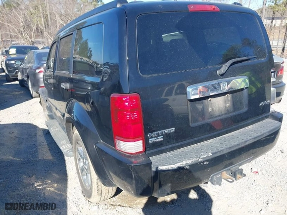 2007 Dodge Nitro SLT with VIN 1D8GU58K87W555759, listed as a IAAI auction lot 41690213 with 196,779 mi miles. Bid and sale history available at carsss.com. Image 3.