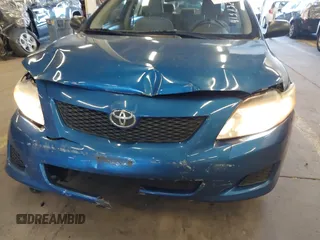 2009 Toyota Corolla with VIN 1NXBU40E19Z027256, listed as a IAAI auction lot 41383298 with 221,545 mi miles. Bid and sale history available at carsss.com. Image 6.
