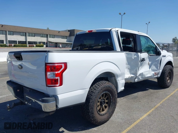 2019 Ford F-150 XL with VIN 1FTEW1C53KKC40961, listed as a IAAI auction lot 41993421 with 63,126 mi miles and . Bid and sale history available at DreamBid. Image 4.