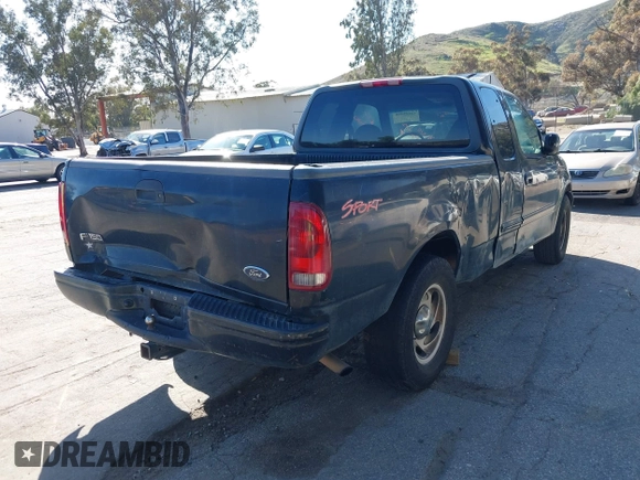 2000 Ford F-150 XL with VIN 1FTRX17W3YNB90314, listed as a IAAI auction lot 41825498 with 369,372 mi miles. Bid and sale history available at carsss.com. Image 4.