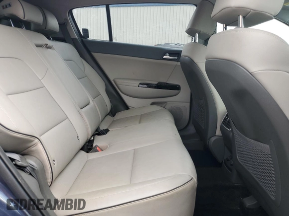 2019 Kia Sportage EX z VIN KNDPNCAC8K7585950, wystawiony jako Copart lot #53893385 z przebiegiem 52 903 mil mil oraz Szkoda całkowita • Salvage title. Historia ofert i sprzedaży dostępna na DreamBid. Obrazek 10.