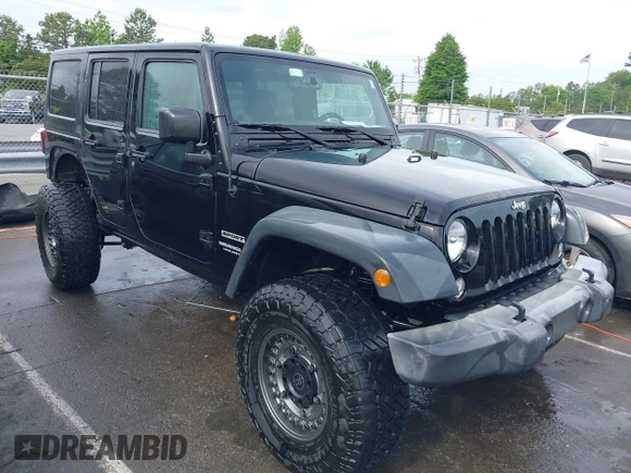 2015 Jeep Wrangler Unlimited Willys Wheeler with VIN 1C4BJWDG4FL687829, listed as a IAAI auction lot 42099147 with 98,969 mi miles and . Bid and sale history available at DreamBid. Image 1.