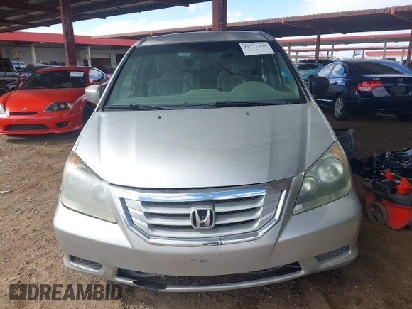 2009 Honda Odyssey LX with VIN 5FNRL38289B049418, listed as a IAAI auction lot 41777253 with 151,512 mi miles and . Bid and sale history available at DreamBid. Image 12.