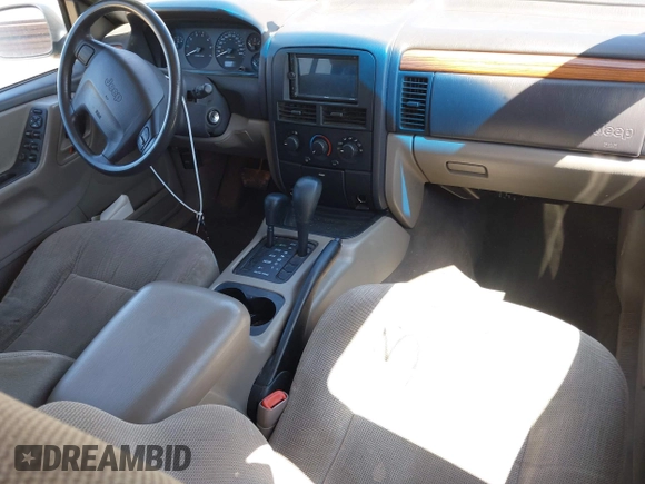1999 Jeep Grand Cherokee Laredo with VIN 1J4GW58S8XC524502, listed as a IAAI auction lot 42193506 with 147,920 mi miles and . Bid and sale history available at DreamBid. Image 22.