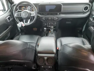 2024 Jeep Wrangler Sahara with VIN 1C4PJXEGXRW210206, listed as a Copart auction lot 58059115 with 14,492 mi miles and Salvage title. Bid and sale history available at DreamBid. Image 8.