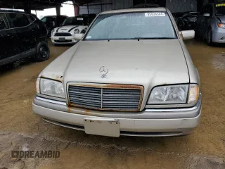 1997 Mercedes-Benz C with VIN WDBHA28E3VF530316, listed as a Copart auction lot 85938384 with 169,664 mi miles and Salvage Title. Bid and sale history available at carsss.com. Image 5.