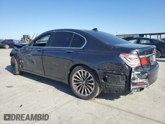 2011 BMW 7 Series 740i with VIN WBAKA4C57BC612487, listed as a Copart auction lot 82633554 with 0 mi miles and Salvage Title. Bid and sale history available at carsss.com. Image 2.