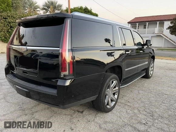 2018 Cadillac Escalade ESV Luxury z VIN 1GYS3HKJ2JR139302, wystawiony jako Copart lot #74639524 z przebiegiem 154 097 mil mil oraz Czysty tytuł • Clean title. Historia ofert i sprzedaży dostępna na DreamBid. Obrazek 4.